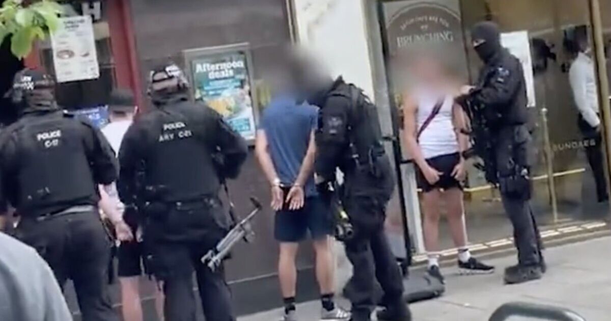 Moment armed police swoop in on men playing with water pistols outside Wetherspoons